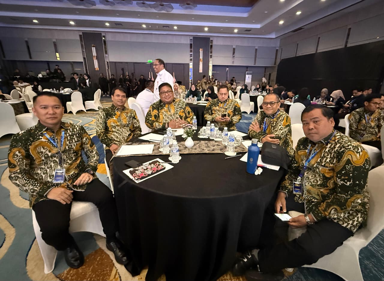 Plt. Ketua Bawaslu Sumsel Ahmad Naafi saat menghadiri  kegiatan Regional Kompetisi Debat Penegakan Hukum Pemilu VI Antar Perguruan Tinggi Se-Indonesia Tahun 2026, Selasa (18/08/2026).
